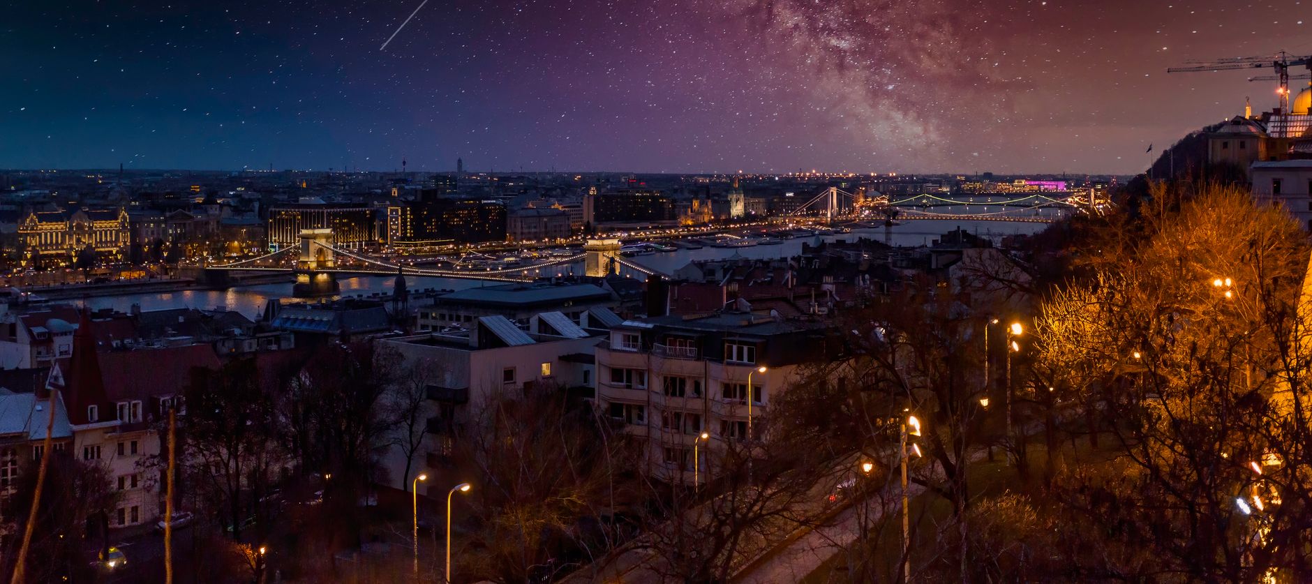 Budapest bridges illuminated over the Danube at night